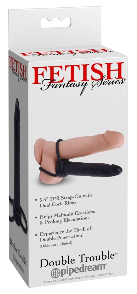 Produktverpackung mit einem abgebildeten Dildo-Set. Text: FETISH Fantasy Series, Double Trouble, pipedream. Enthält einen schwarzen Dildo und einen Ring.