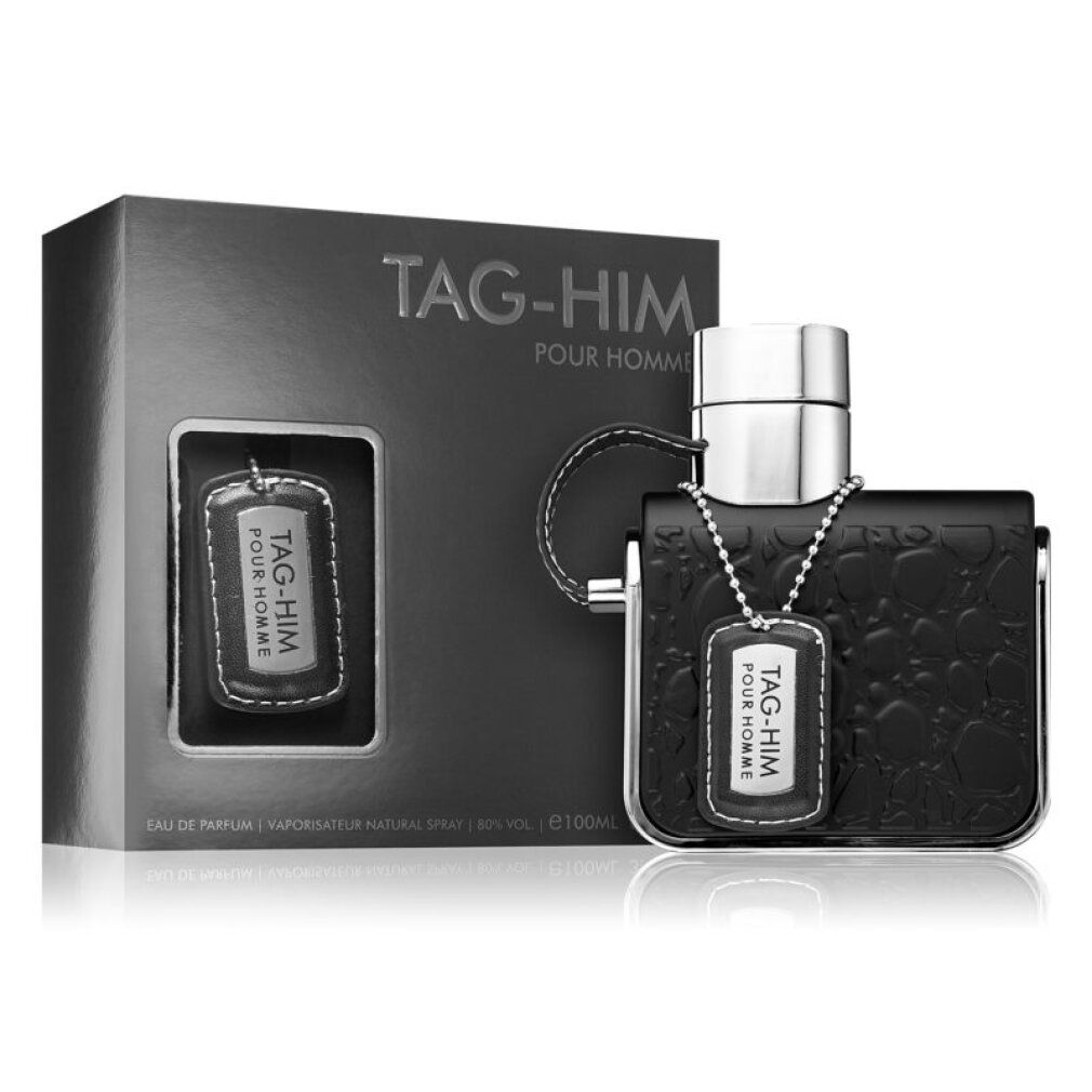 Eau de Parfum mit Verpackung. Schwarze Flasche mit silbernem Verschluss und Anhänger. Text: TAG-HIM POUR HOMME.
