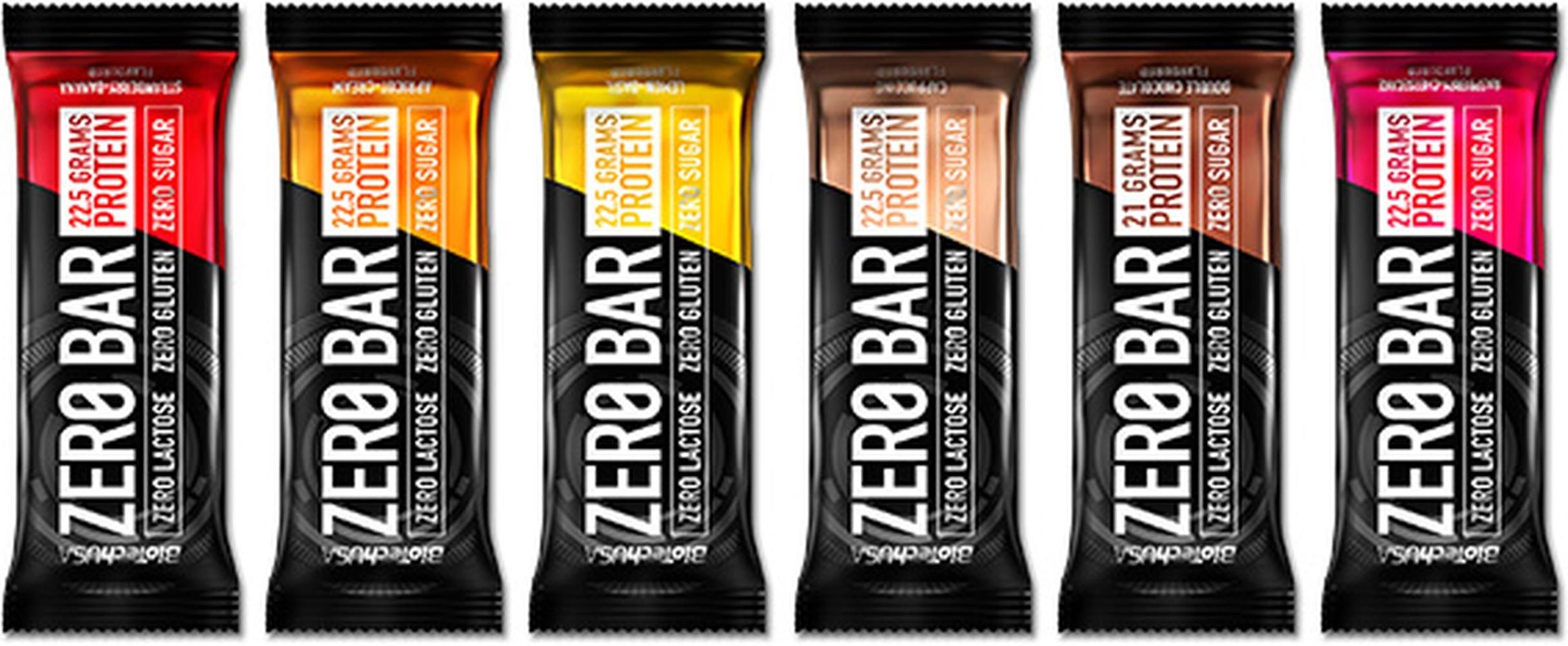 Reihe von Proteinriegeln in verschiedenen Farben. Aufschrift: ZERO BAR, 22g Protein, laktosefrei, glutenfrei, zuckerfrei.