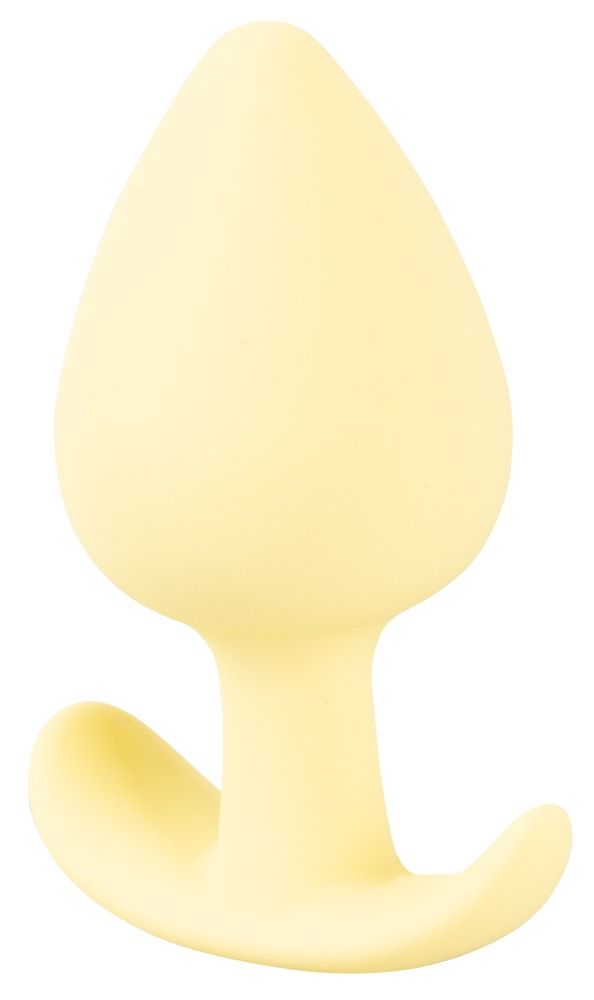 Gelber Analplug mit tropfenförmigem Kopf und gebogener Basis. Aus weichem Material.