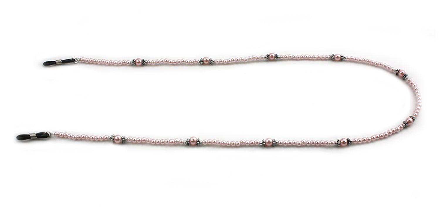 Brillenkette mit rosa Perlen und schwarzen Enden. Die Kette ist in einer U-Form angeordnet.