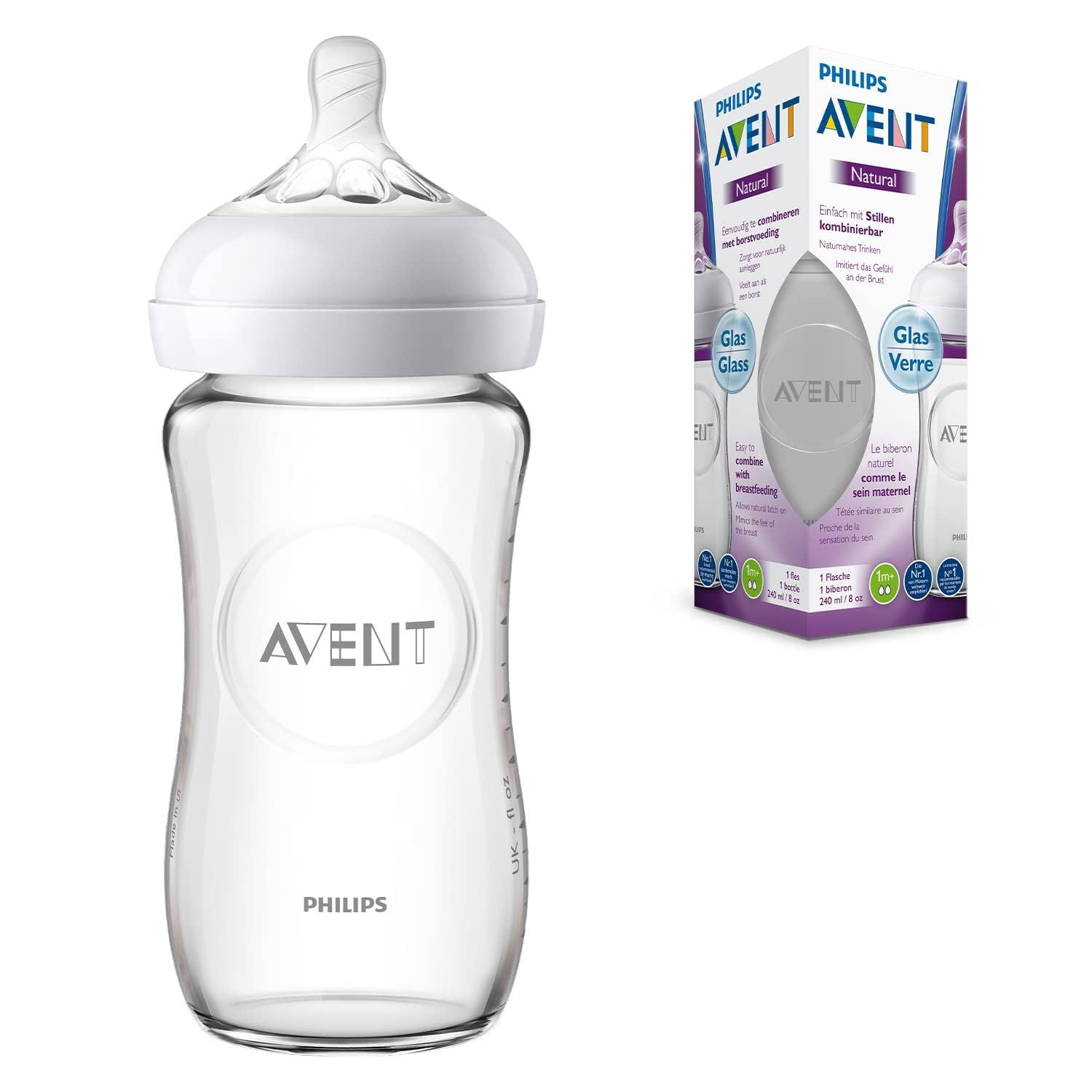 Glasflasche mit weißem Sauger und Deckel. Verpackung mit Produktname und Logo.
