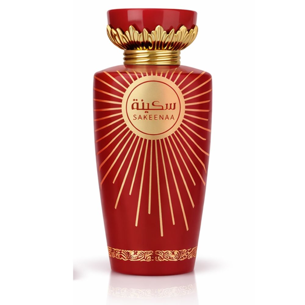 Rote Parfumflasche mit goldenen Verzierungen. Goldener Schriftzug: Sakeenaa. Eau de Parfum. Dekorative Kappe.