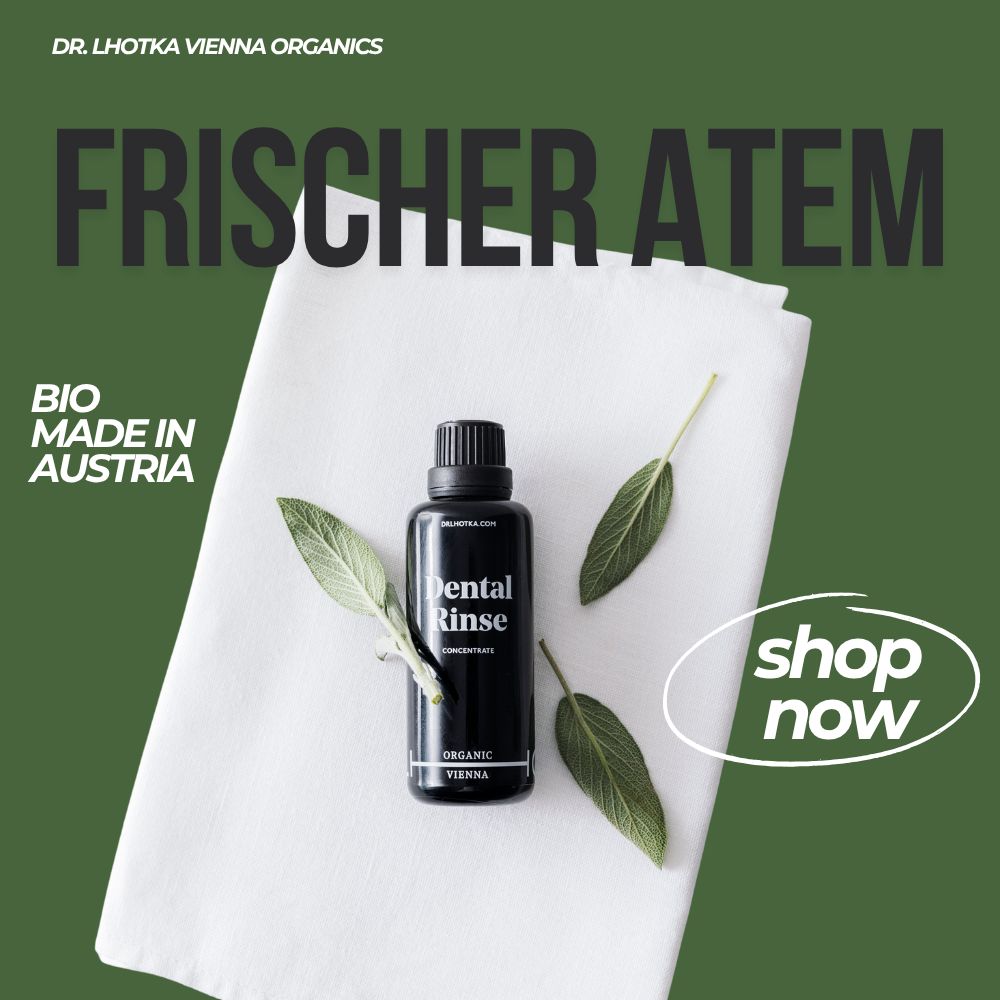 Schwarze Flasche mit schwarzem Deckel, „Dental Rinse“ Schriftzug. Auf weißem Tuch mit Blättern. Text: „Frischer Atem“ und „Shop now“.