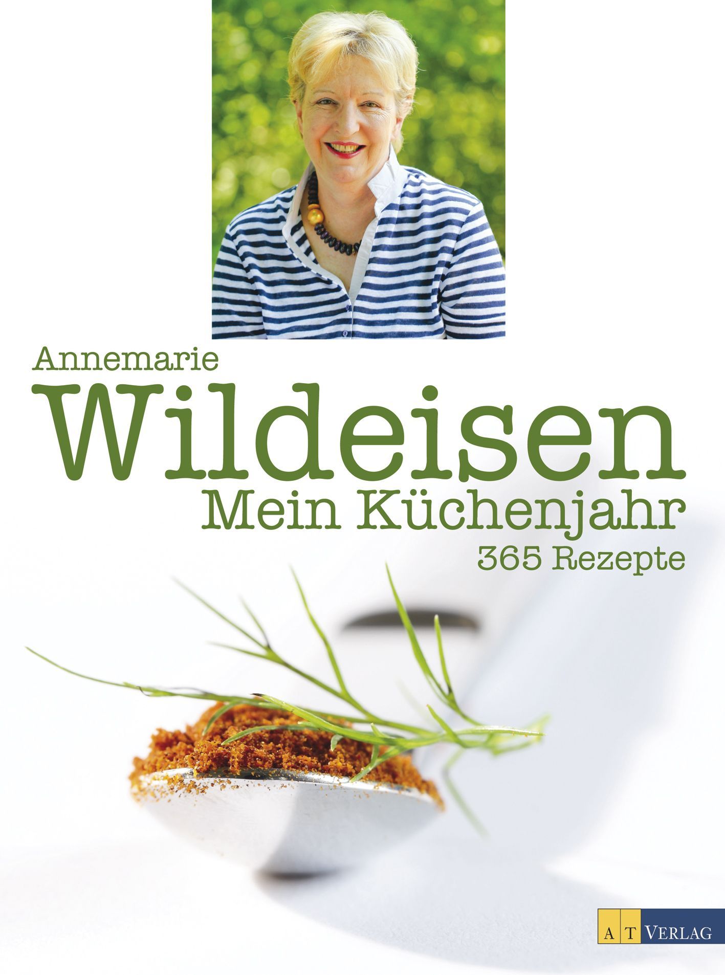 Buchcover mit Porträt einer Frau. Titel: Mein Küchenjahr, 365 Rezepte. Autorin: Annemarie Wildeisen. Verlag: AT Verlag. Löffel mit Gewürz.