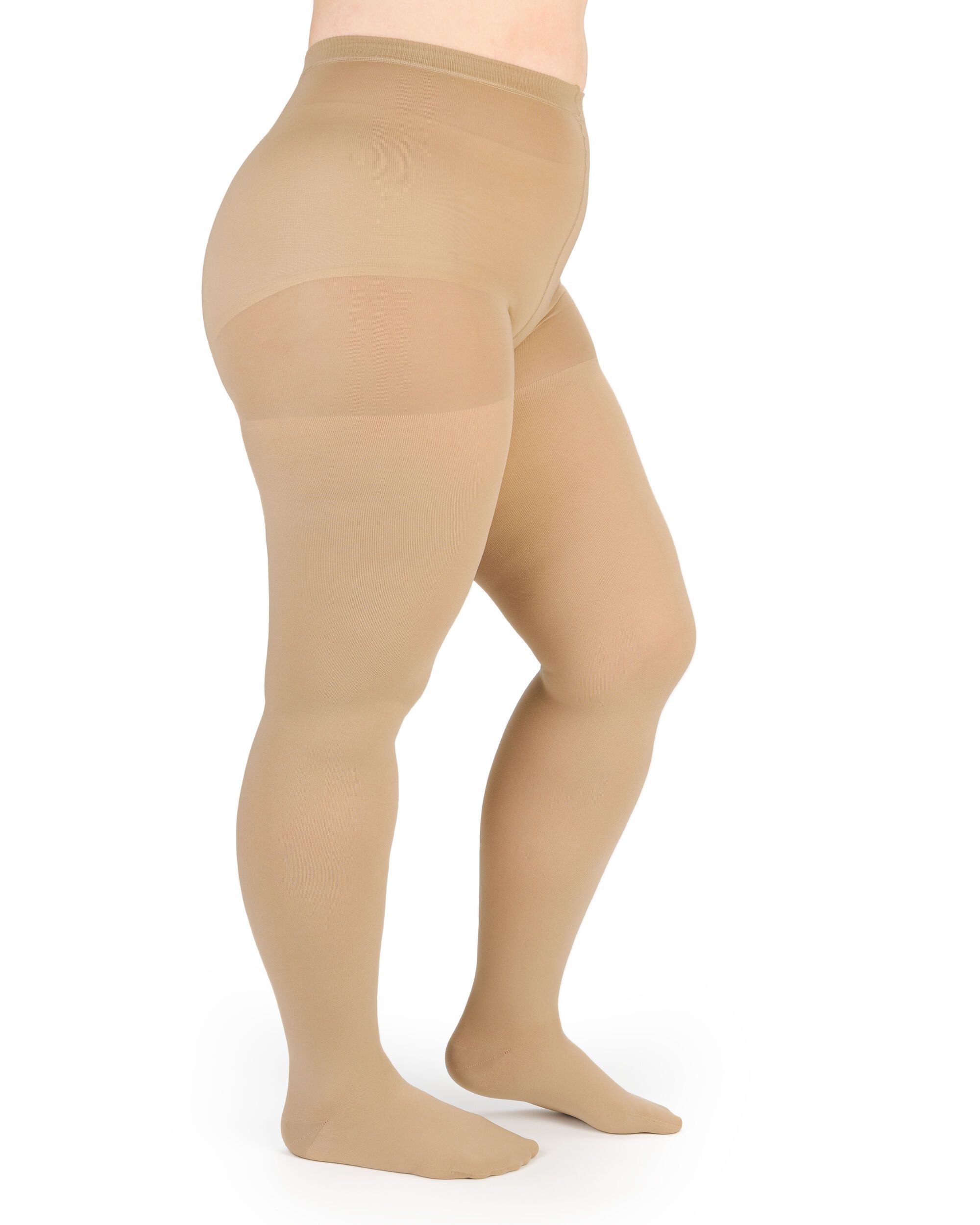 Beige Kompressionsstrumpfhose, seitliche Ansicht. Das Produkt bedeckt die Beine bis zum Bauch. Sichtbare Verstärkung im Bereich der Oberschenkel.