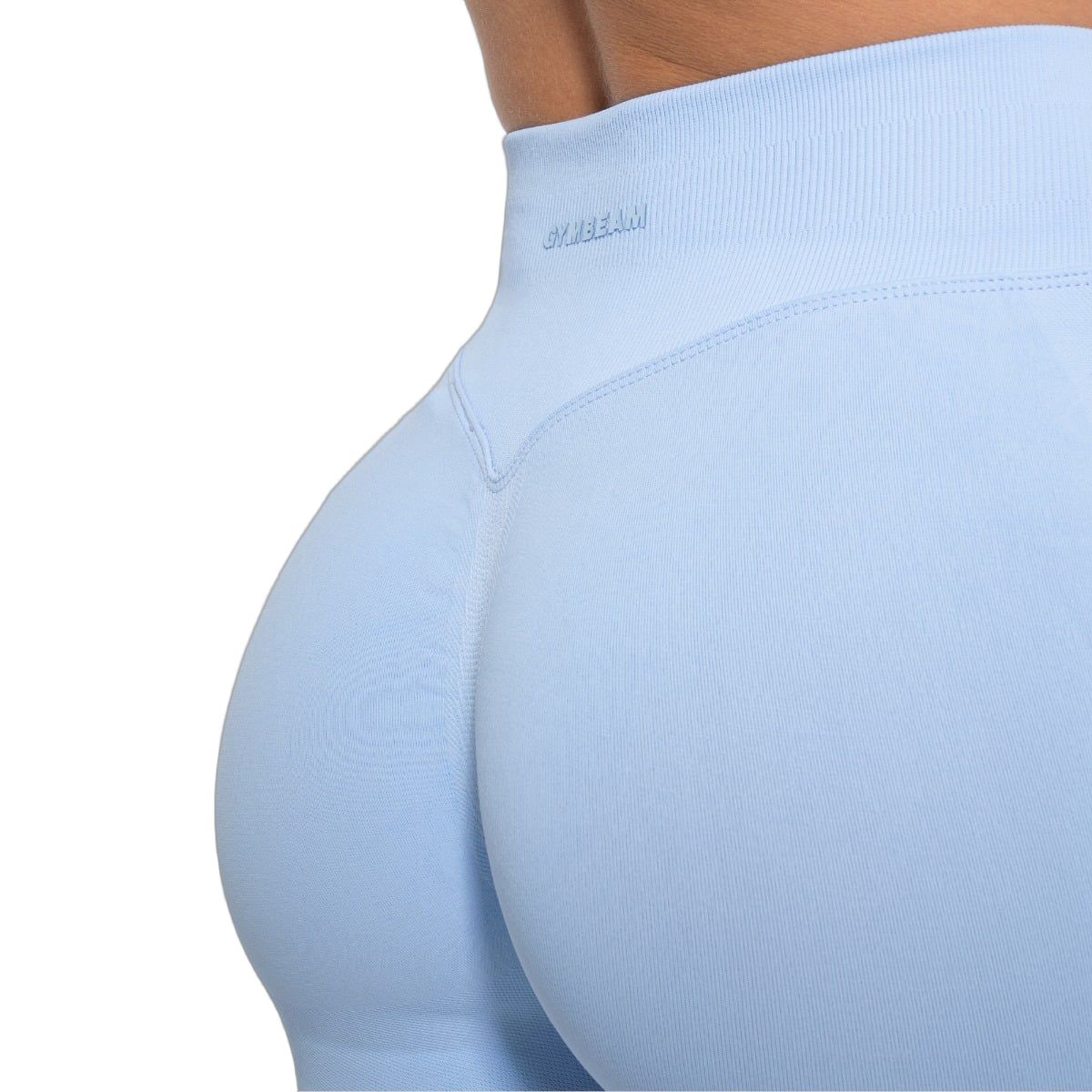 Detailansicht der babyblauen, nahtlosen Leggings mit hohem Bund und Push-Up-Effekt.