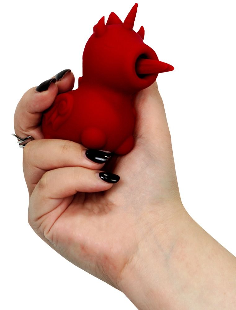 Roter Unihorn Blaze Diablo Vibrator in einer Hand gehalten, Einhorn-Teufel-Form.