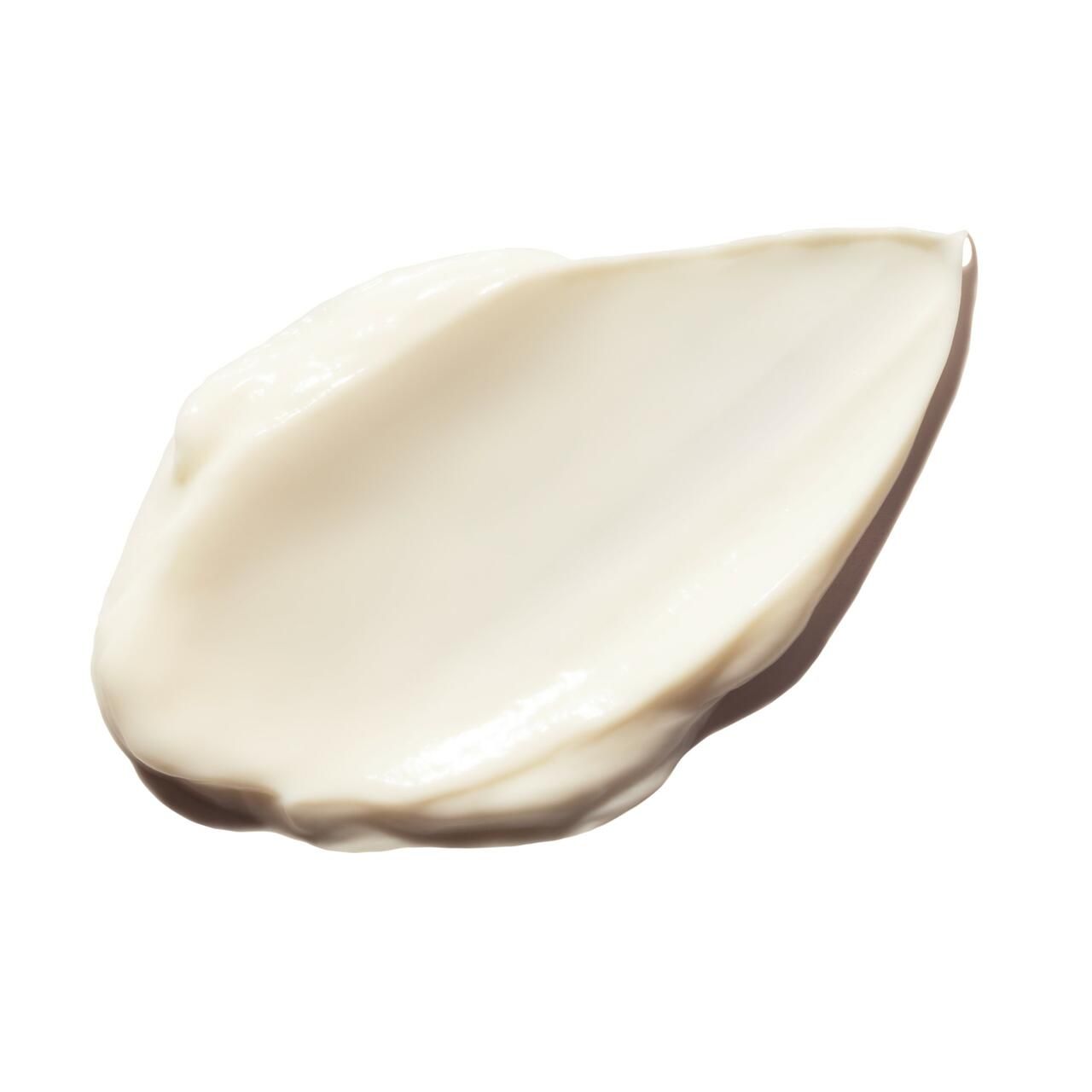 Creme-Probe auf weißem Hintergrund. Cremefarbene Textur.