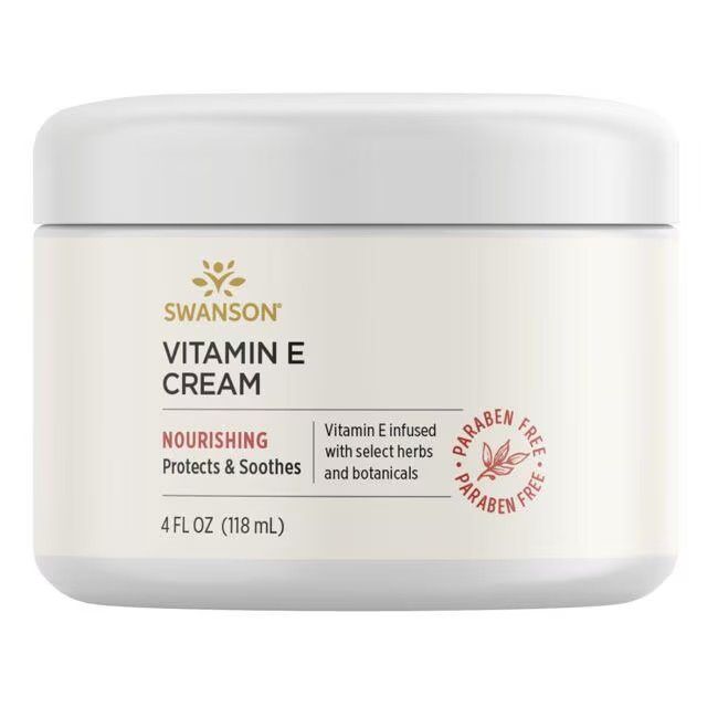 Weißer Tiegel mit Aufschrift SWANSON Vitamin E CREAM. Enthält 4 FL OZ (118 mL). Text: Nourishing, Protects & Soothes. Paraben Free.