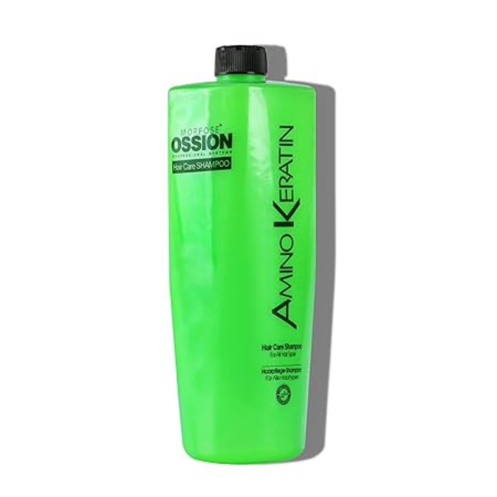 Grüne Flasche Ossion Amino Keratin Shampoo. Text: Hair Care Shampoo. Schwarzer Deckel. Weißer Hintergrund.