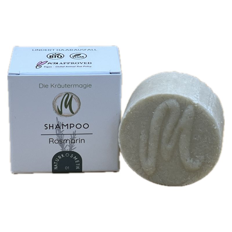 Karton und Shampoo-Stück. Shampoo zylindrisch, hellgrau. Karton mit Aufdruck: Shampoo Rosmarin, Logo und Siegel.
