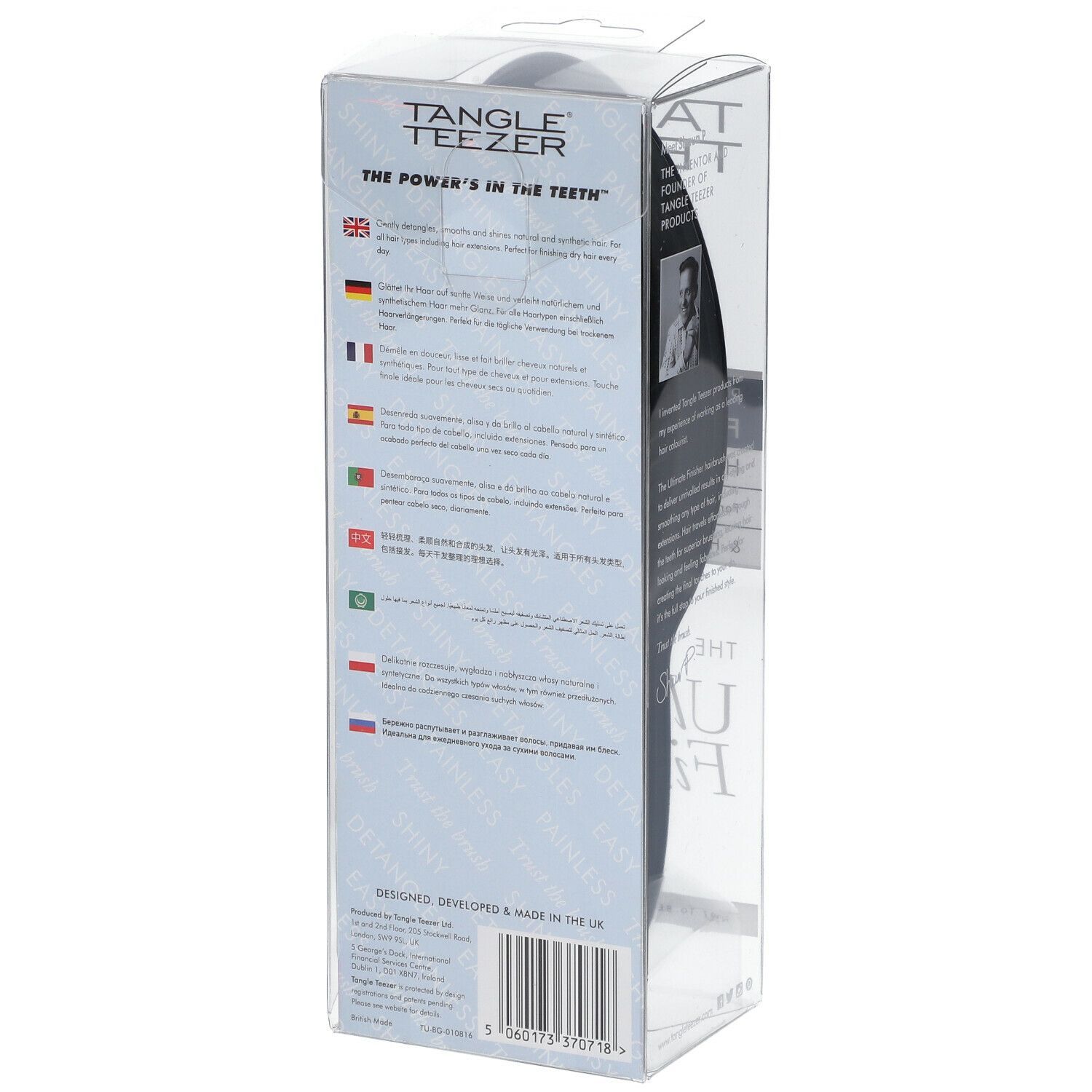 Haarbürste in Klarsichtverpackung. Aufschrift: Tangle Teezer. Rückseite mit Text in verschiedenen Sprachen. Schwarze Bürste.