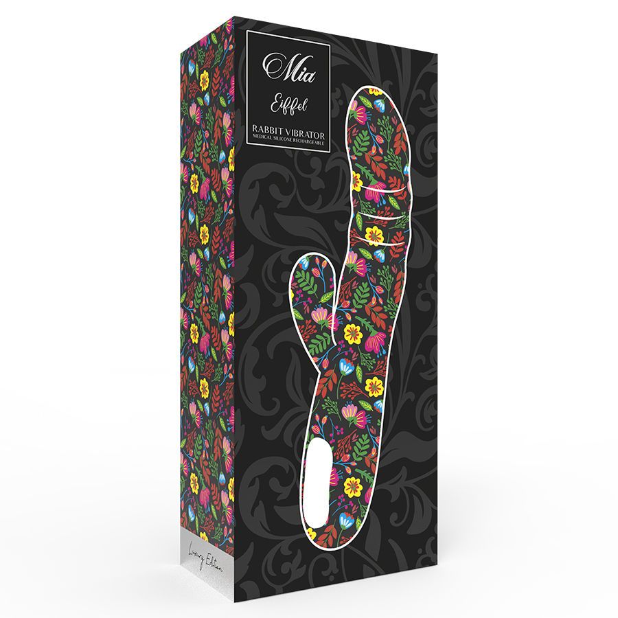Verpackung für Mia Eiffel Drehvibrator. Schwarzer Hintergrund mit floralem Muster und Produktnamen.