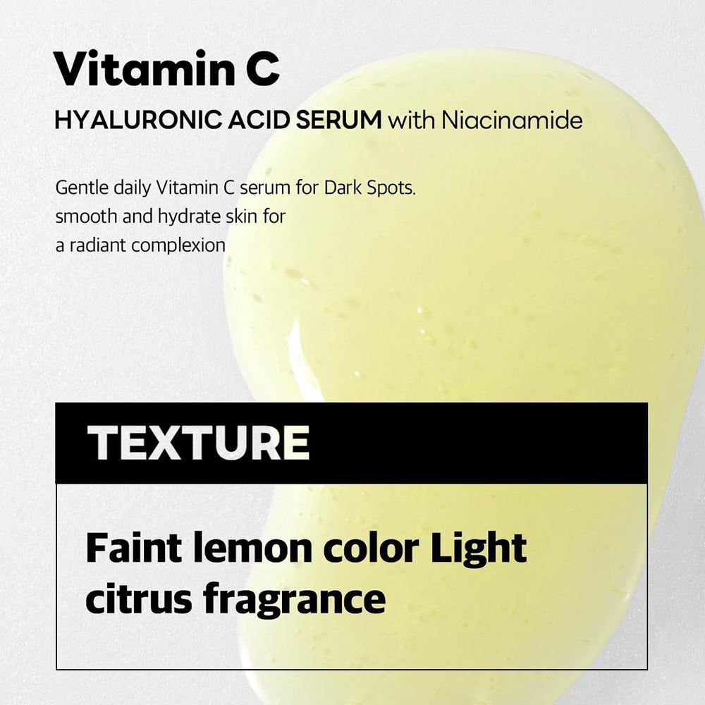 Serumflasche mit schwarzem Deckel. Text: Vitamin C, Hyaluronsäure Serum. Gelbe Serumspur.