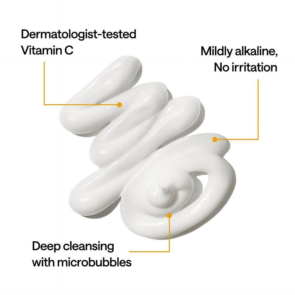 Weißes Produkt mit Text. Beschriftung: Dermatologisch getestet, Vitamin C, Tiefenreinigung, keine Irritation. Gelbe Textfelder.
