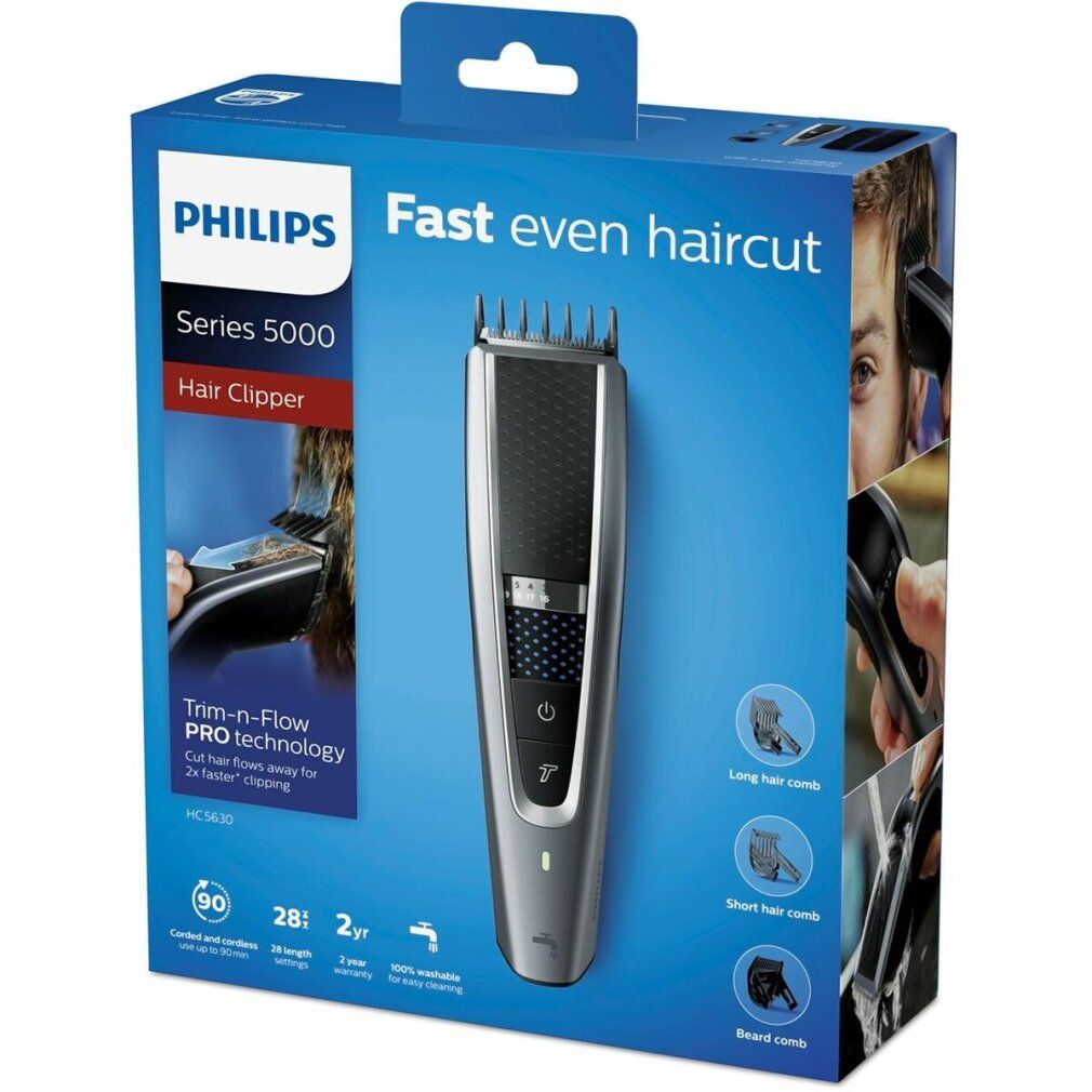 Philips Haarschneider auf Verpackung. Schwarzes und silbernes Gerät. "Fast even haircut" und "Trim-n-Flow PRO technology" sind sichtbar.