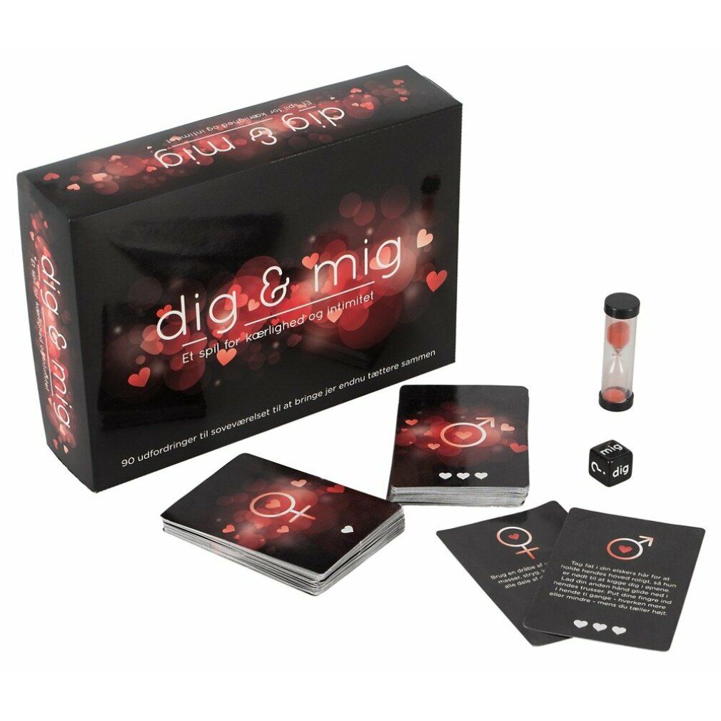 Schwarze Box, Karten, Sanduhr und Würfel. Auf der Box steht "dig & mig".