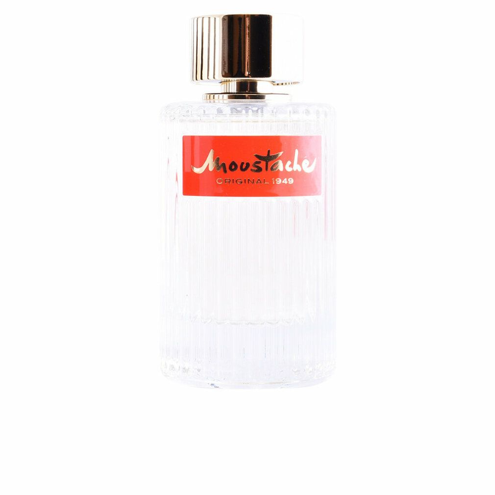 Rochas Moustache Eau de Toilette Flakon. Zylindrische Form, geriffeltes Glas, rotes Etikett mit goldener Schrift, goldener Verschluss.