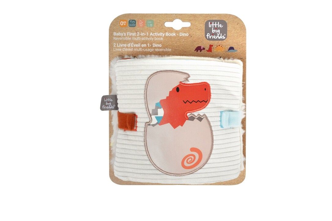 Verpacktes Stoffbuch mit Dino im Ei-Motiv. Baby's First 2-in-1 Activity Book. Kartonverpackung.