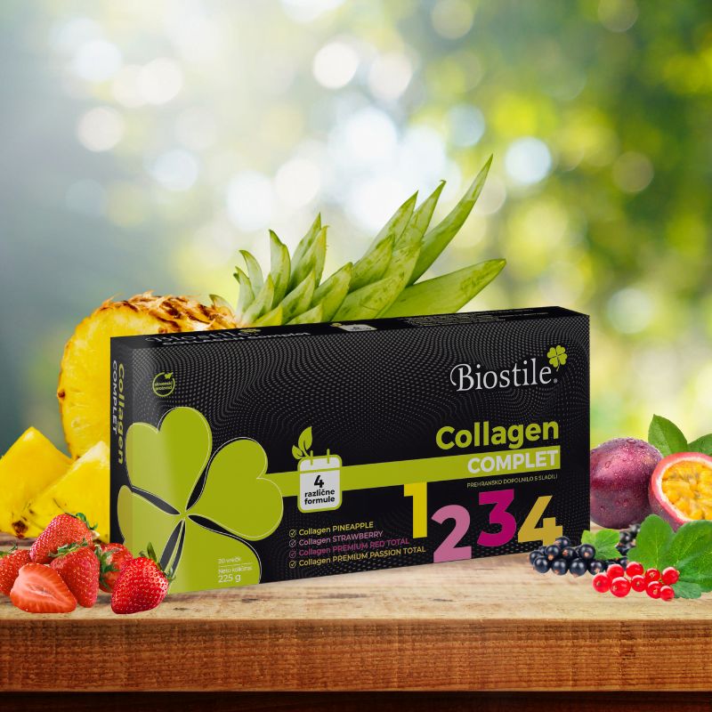 Biostile Collagen Komplett Packung auf Holztisch mit Früchten.