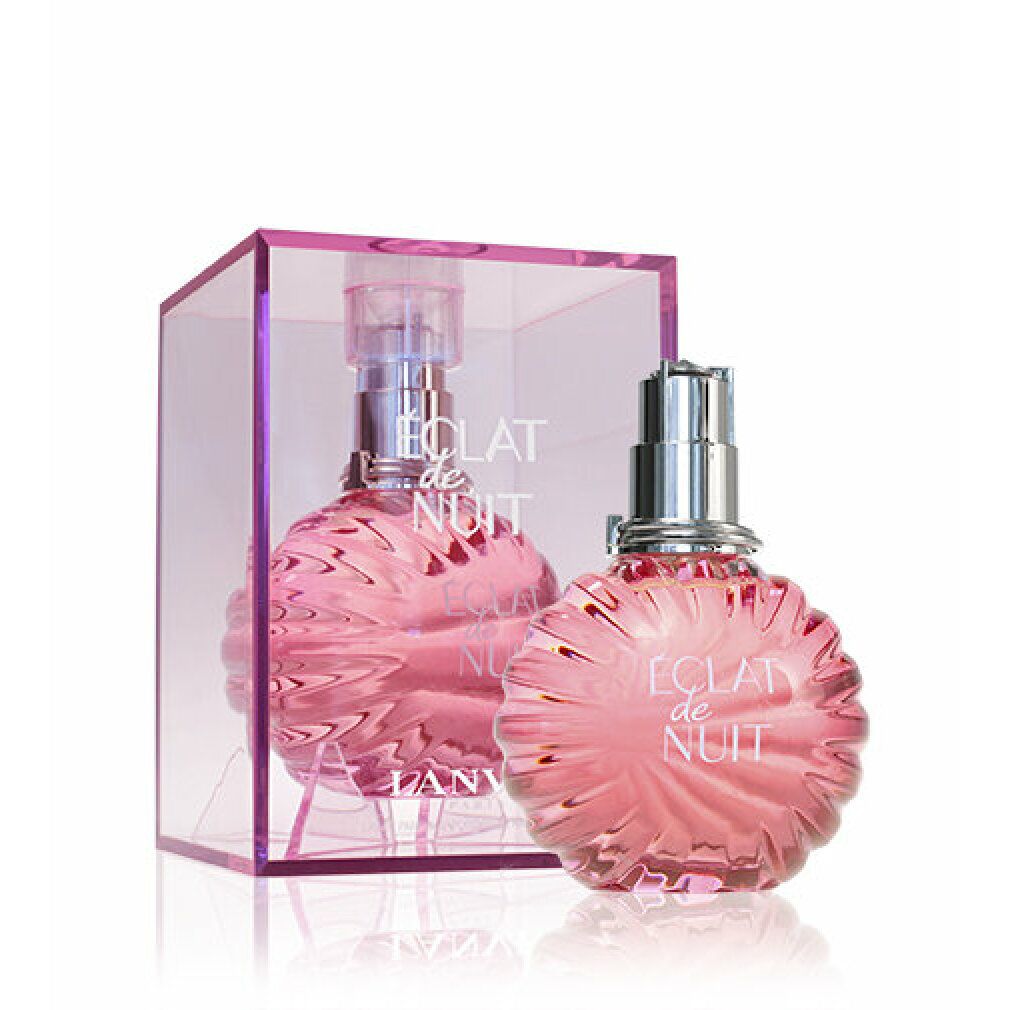 Rosa Flakon in transparenter Box. Aufschrift: ÉCLAT DE NUIT, LANVIN. Flakon mit silbernem Zerstäuber.