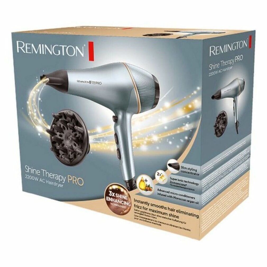 Haartrockner in Verpackung. Marke: Remington Shine Therapy PRO. Zubehör: Diffusor. Text: 2200W, 3x Shine Enhancing.