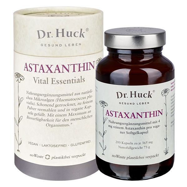 Braune Glasflasche und zylindrische Verpackung. Beide mit Etiketten und Produktnamen. Aufschrift: Dr. Huck Astaxanthin Kapseln Vegan.