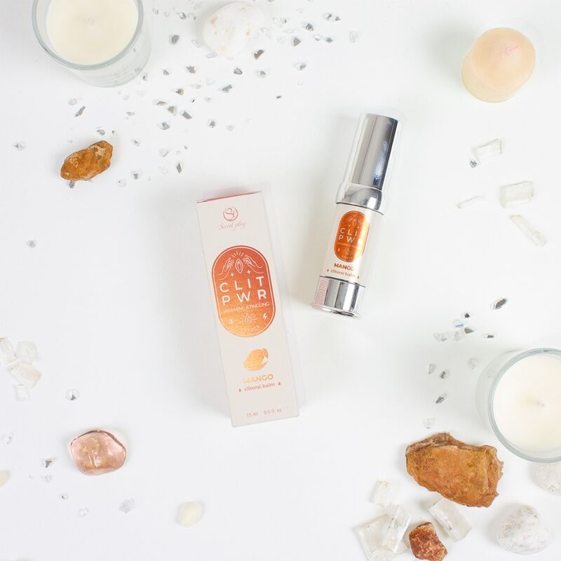 Produkt und Verpackung. Aufschrift: CLIT PWR Mango. Flasche mit silberner Kappe.