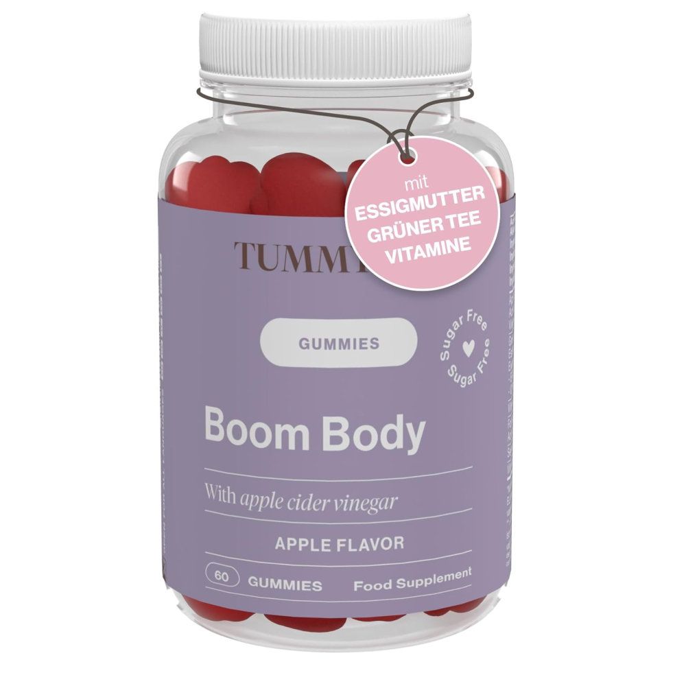 Flasche mit roten Gummibärchen. Aufschrift: Tummy Tox Boom Body Gummies. Anhänger mit Inhaltsstoffen: Essigmutter, grüner Tee, Vitamine.