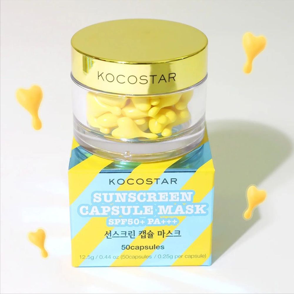 Produktverpackung mit KOCOSTAR-Schriftzug und Sonnencreme-Kapsel-Maske. 50 Kapseln. Gelbe Kapseln umgeben die Verpackung.