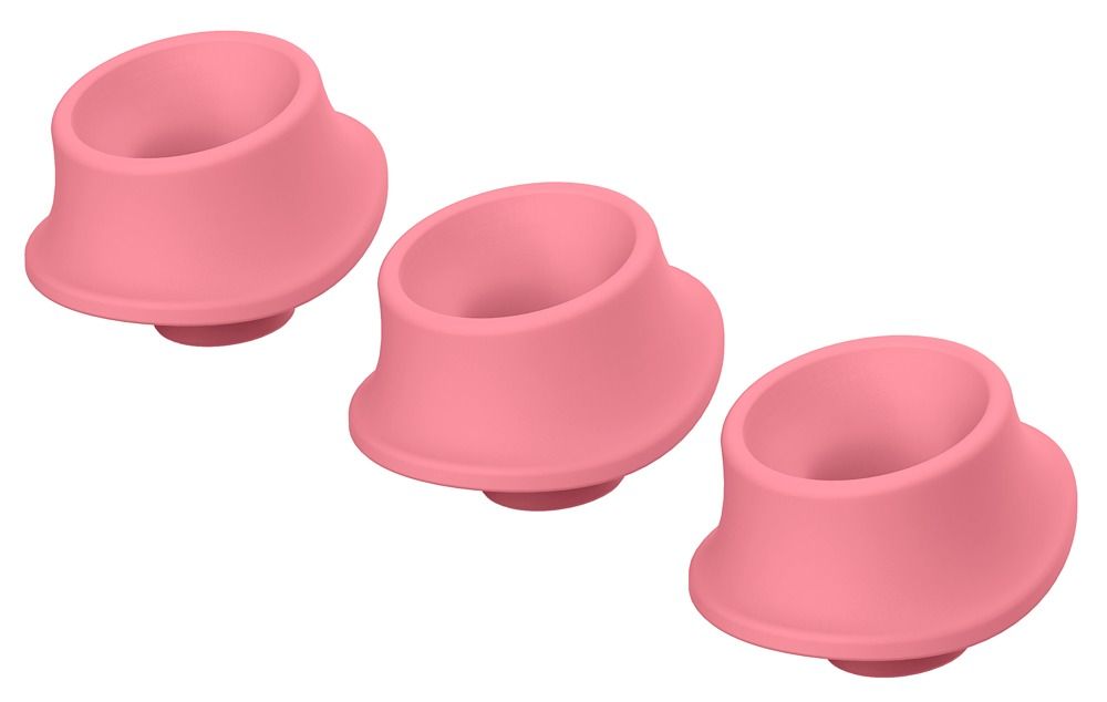 Drei rosa Ersatzkappen für Womanizer-Produkte, aus flexiblem Material.