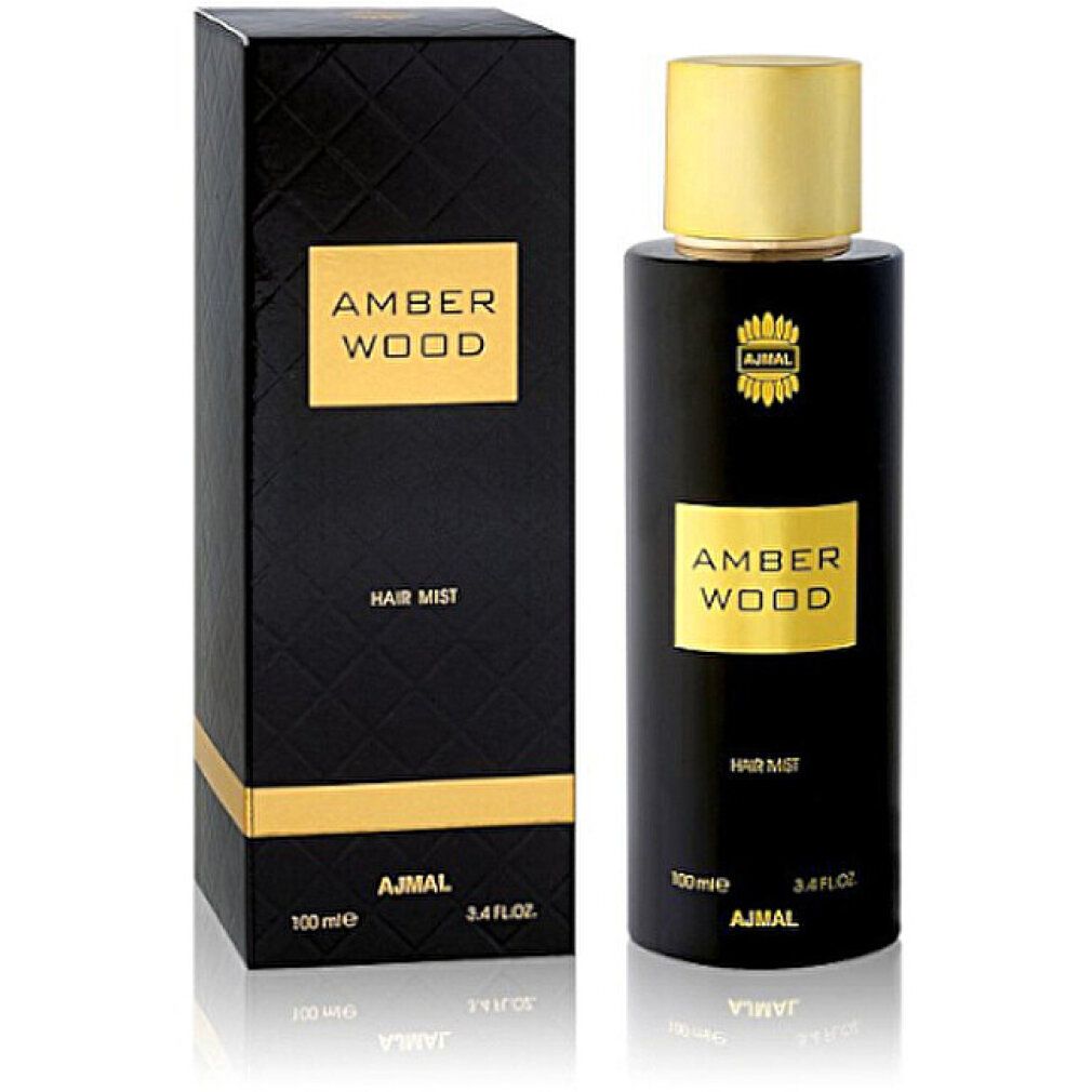 Schwarze Flasche und Schachtel. Goldfarbenes Etikett mit "AMBER WOOD" und "HAIR MIST". Marke "AJMAL".