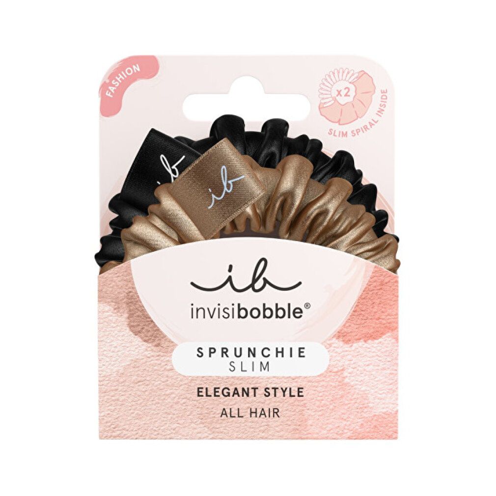 Verpackung mit zwei Haargummis, schwarz und goldfarben. Produktname und Logo sichtbar. Aufschrift: Sprunchie Slim, Elegant Style, All Hair.
