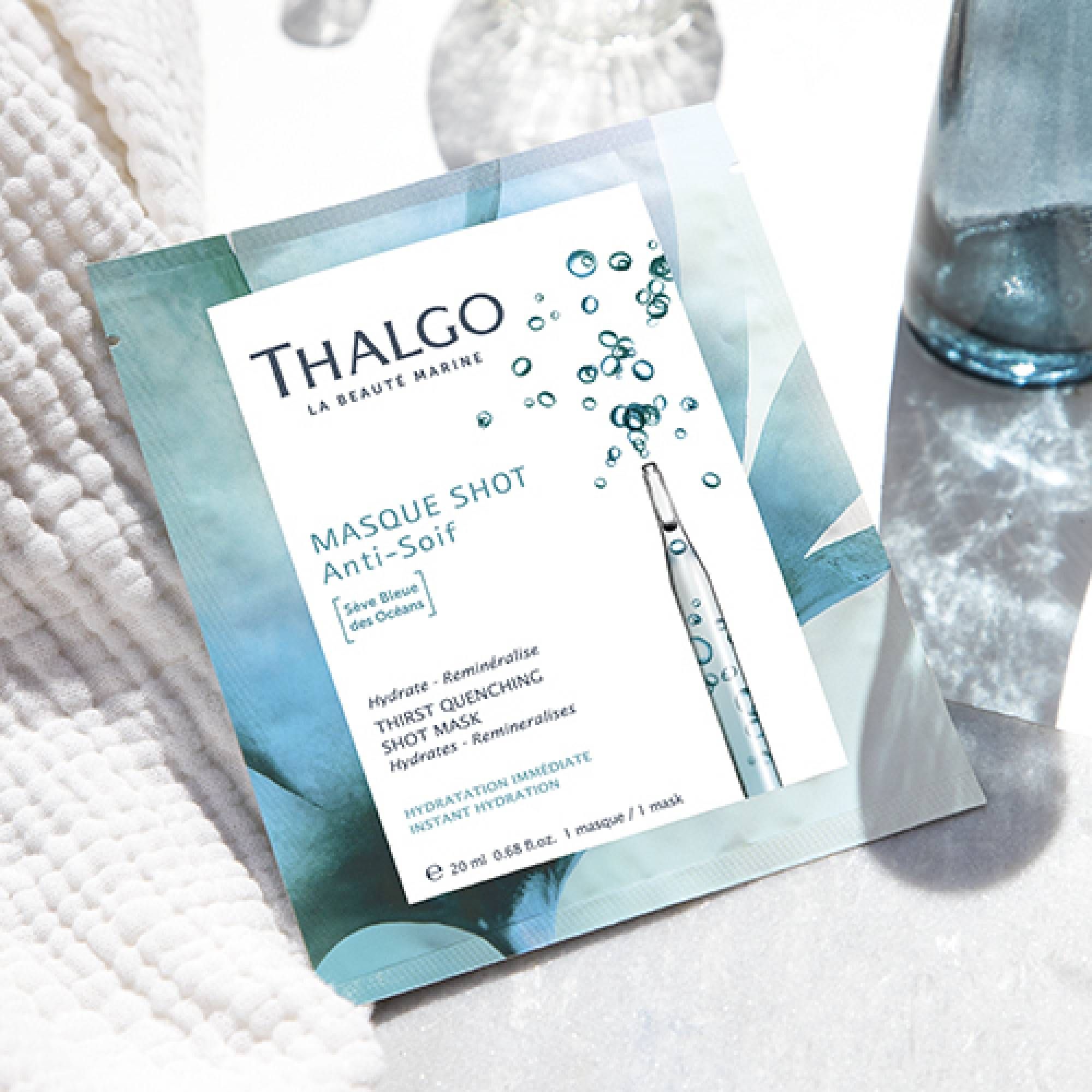 THALGO Maske. Blaue Verpackung mit Produktabbildung und Schriftzug. Enthält eine Ampulle. Text: Masque Shot Anti-Soif.