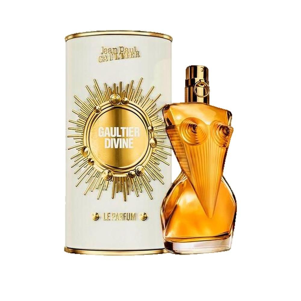 Parfümflakon und Verpackung. Flakon in Form eines Frauenkörpers. Goldfarbenes Glas, goldfarbener Verschluss. Verpackung weiß mit goldenem Logo.