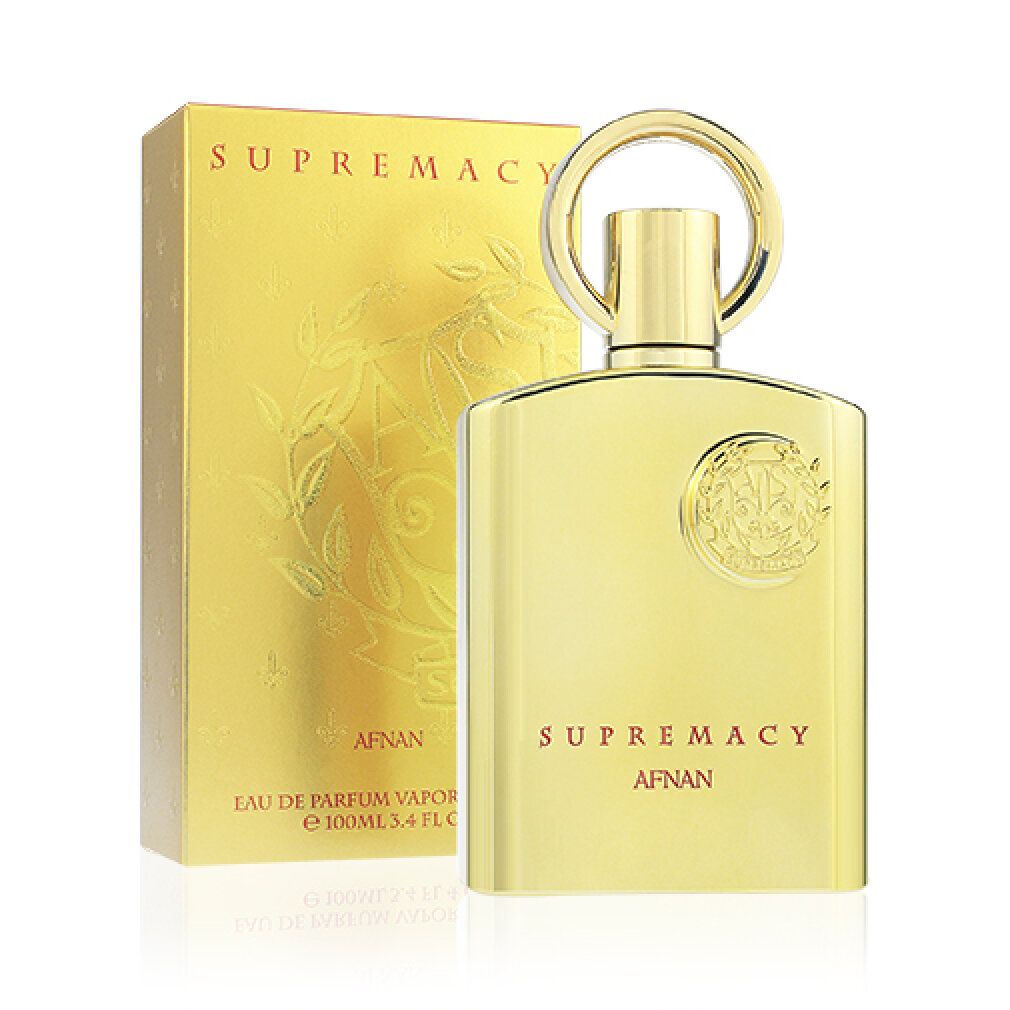 Goldene Parfümflasche und Karton mit der Aufschrift 'Supremacy Afnan'. Flasche hat einen runden Griff.