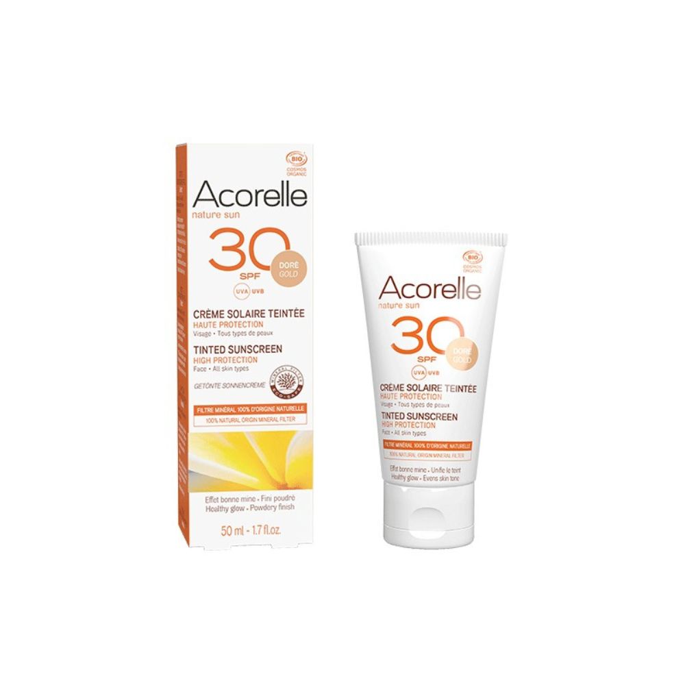 Sonnencreme-Tube und -Verpackung. Beide zeigen "Acorelle", "30 SPF" und "Gold". Text: "Crème Solaire Teintée".
