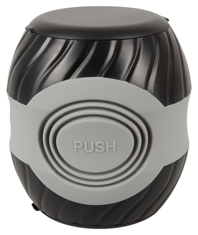 Schwarz-graues, zylindrisches Produkt mit gewellter Oberfläche. Graues Band mit „PUSH“-Schriftzug. Schwarzer Deckel.
