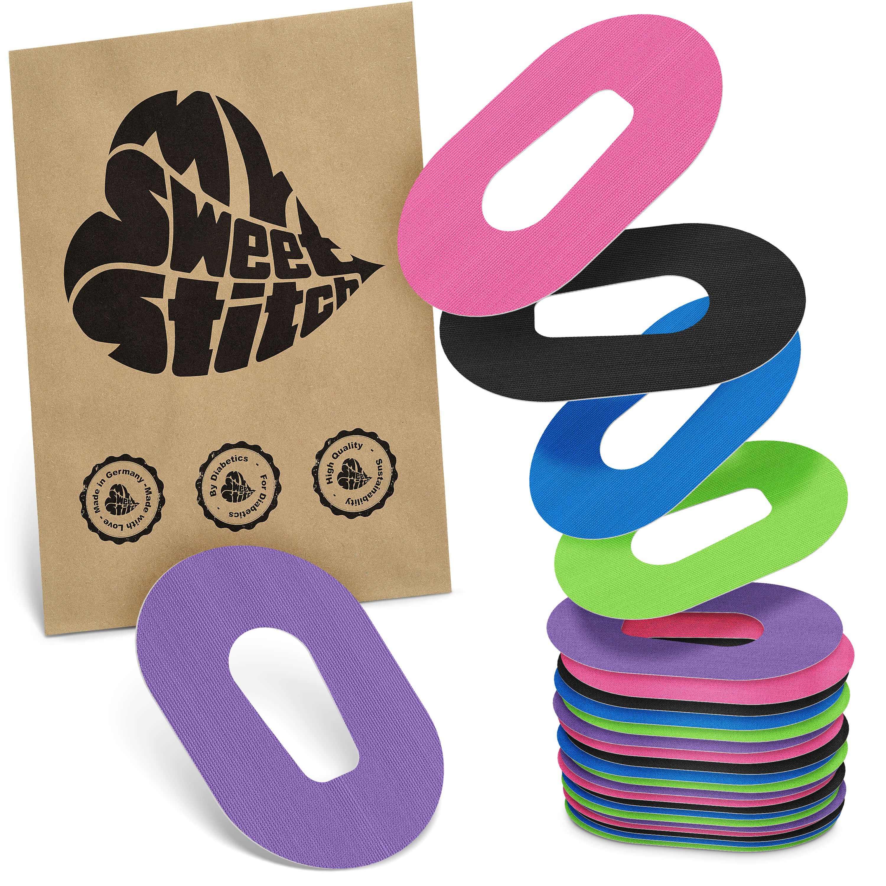 Fixierpflaster in verschiedenen Farben. Verpackung mit Logo 'MySweetStitch'. Mehrere Pflaster gestapelt.