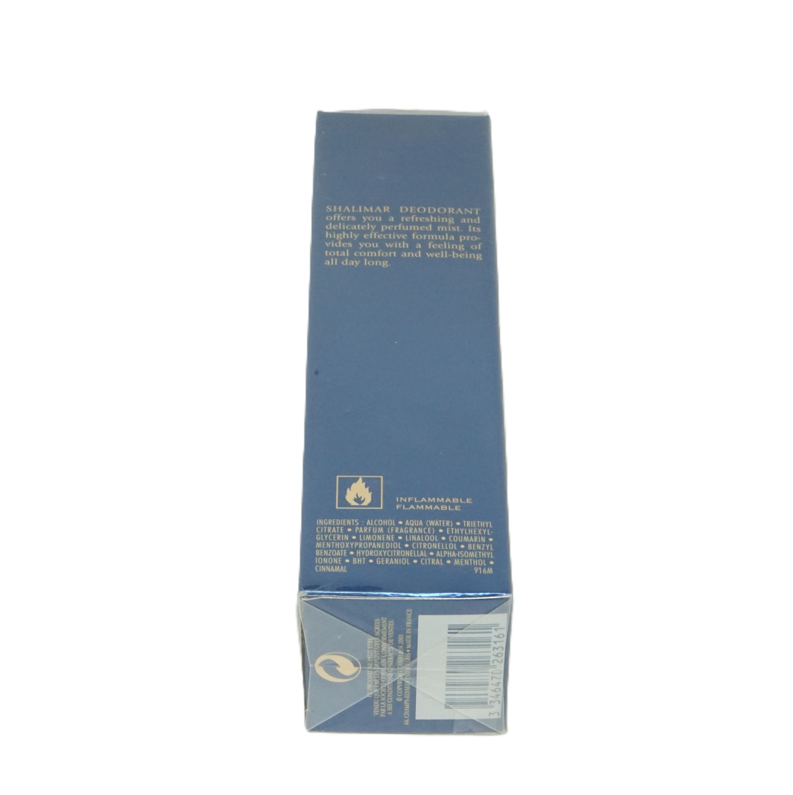 Blau-graue Schachtel. Text: Shalimar Deodorant. Aufschrift: Entzündlich. Barcode unten. Logo.