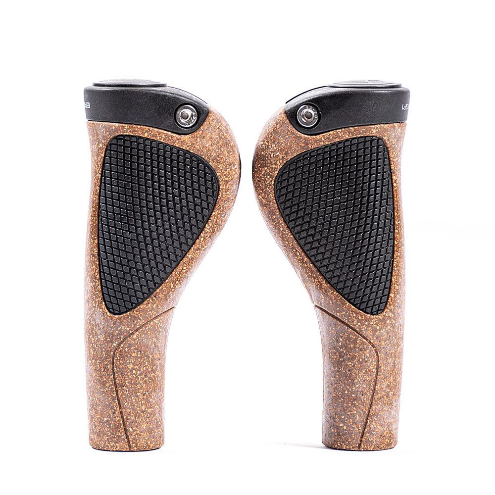 Zwei Fahrradgriffe aus Kork und schwarzem Gummi. Mit Metallkappe und Schraube. Ergonomische Form.