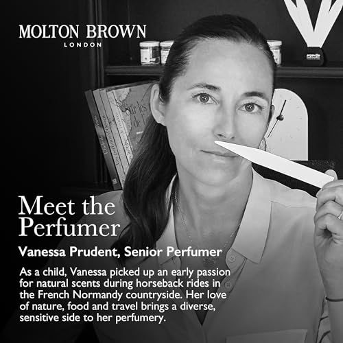 Porträt einer Frau, die einen Duftstreifen unter die Nase hält. Text: Meet the Perfumer. Marke: Molton Brown London.