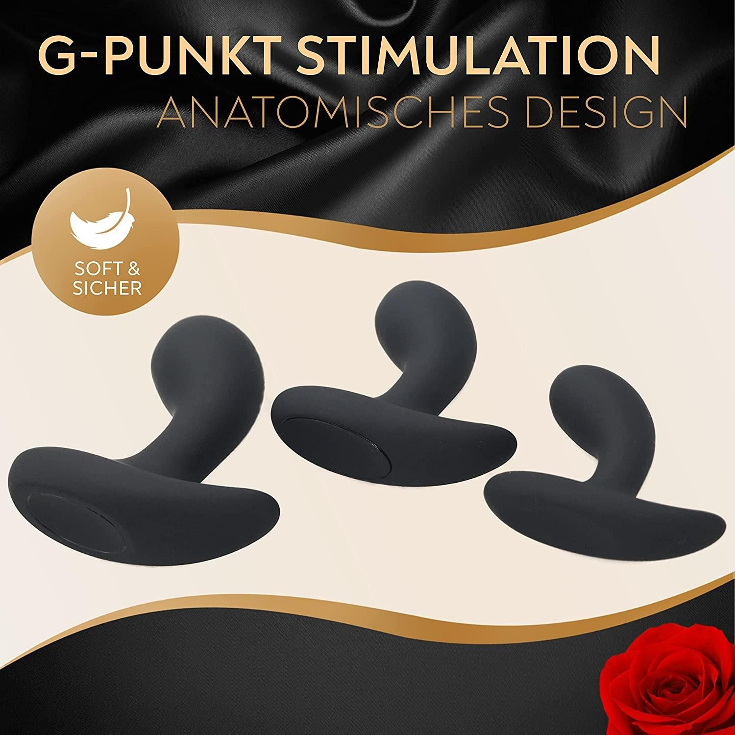 Drei schwarze Analplugs, verschiedene Größen, mit Text: G-Punkt Stimulation, anatomisches Design.