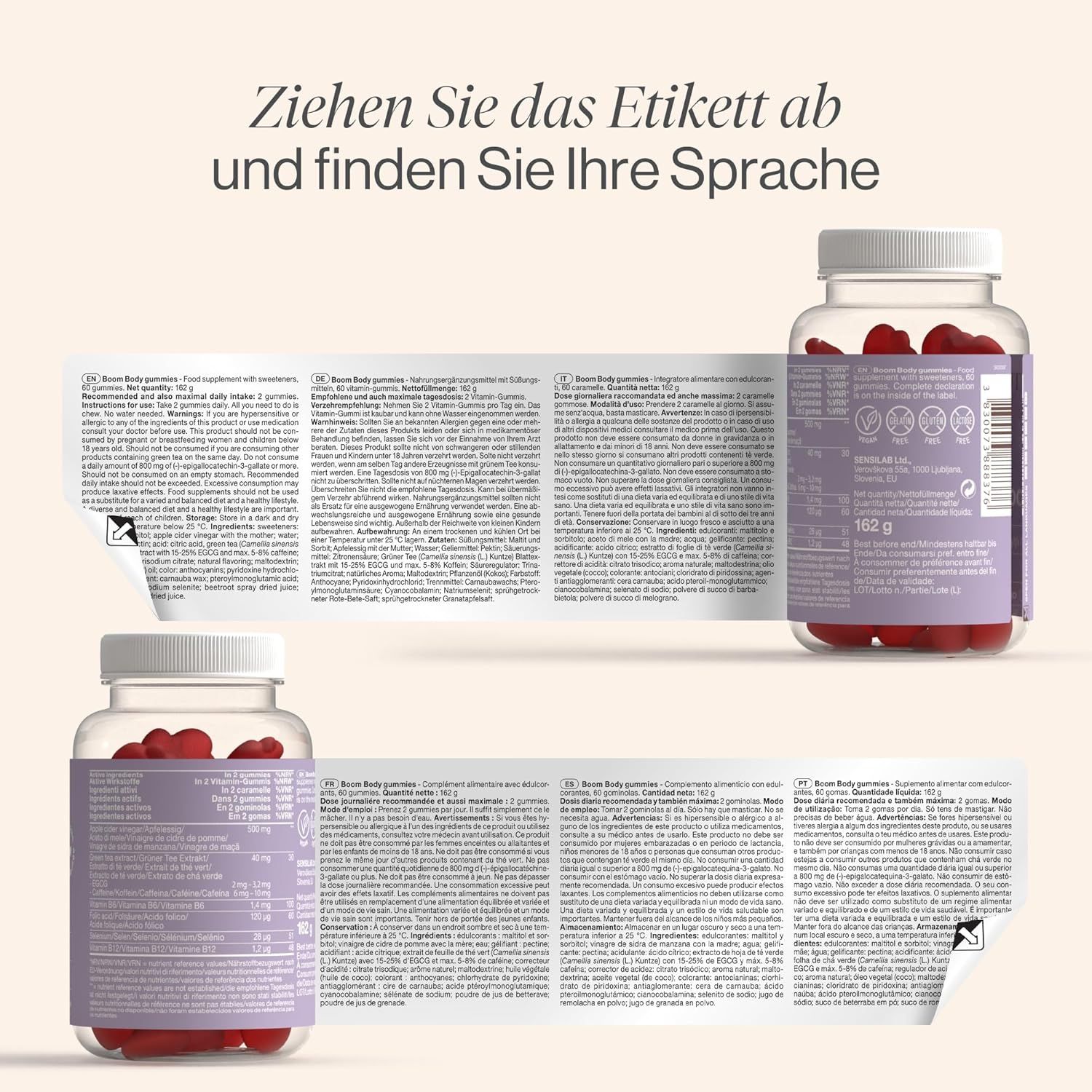 Zwei Flaschen mit roten Gummibärchen. Aufschrift: Tummy Tox Boom Body Gummies. Etikett wird abgezogen, Text sichtbar.