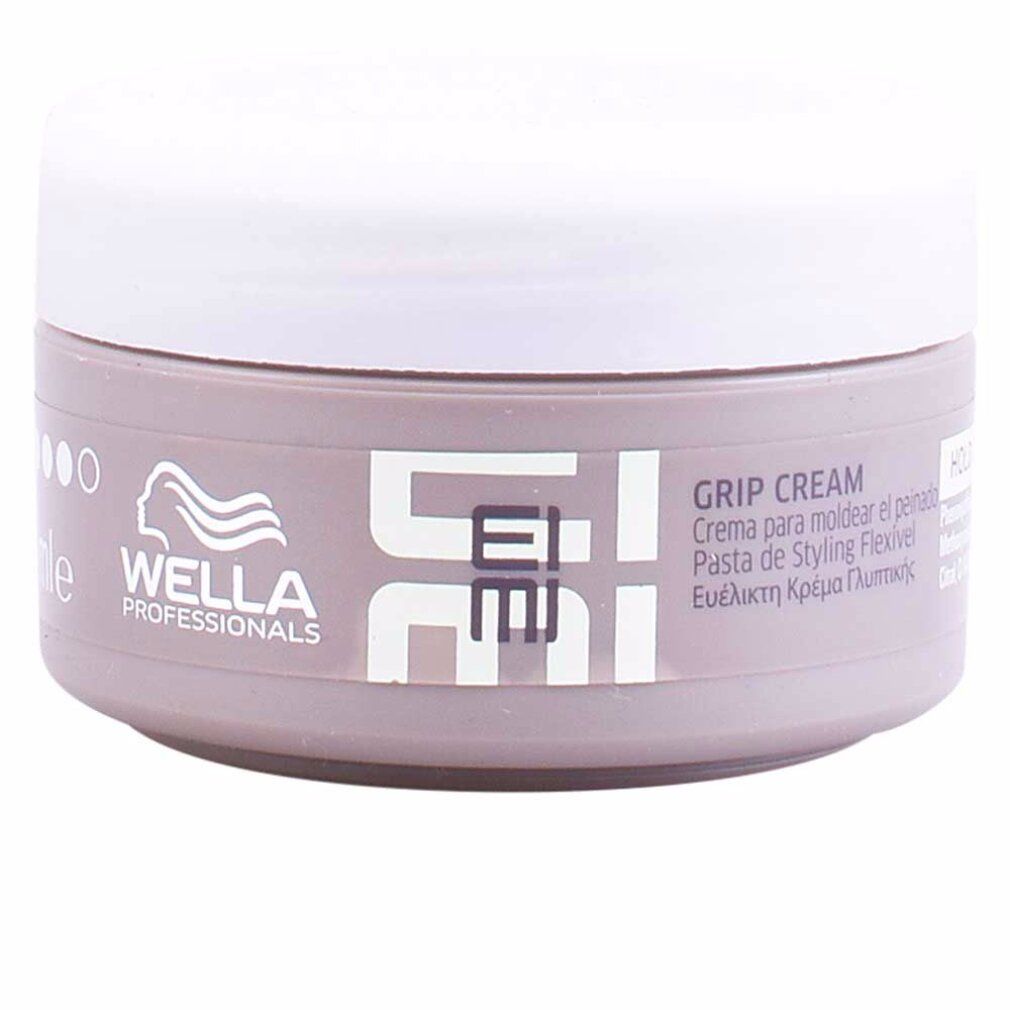 Behälter mit weißem Deckel. Aufschrift: Wella Eimi Grip Cream. Mehrsprachige Produktbezeichnungen.