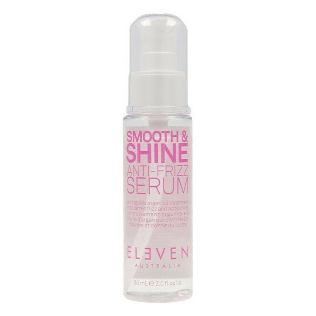 Klarer Behälter mit rosa Etikett. Text: Smooth & Shine Anti-Frizz Serum. Marke: Eleven Australia. Mit Sprühkopf.