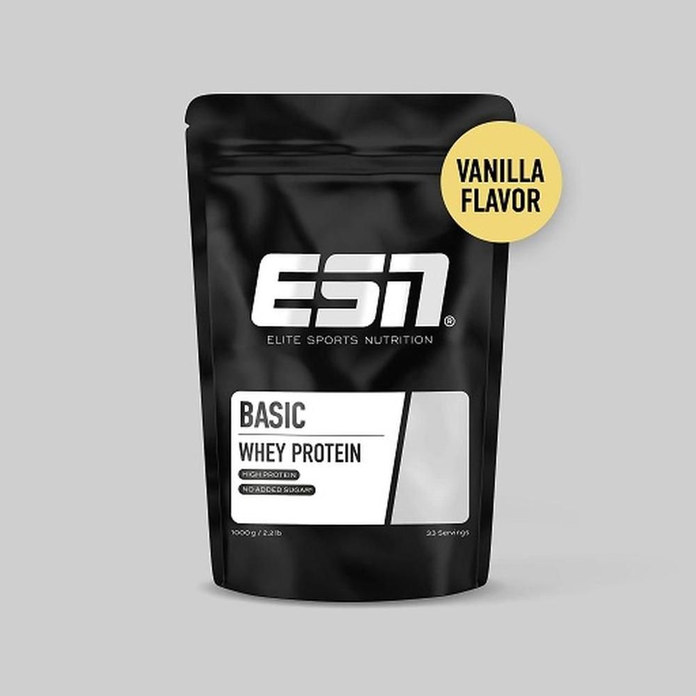 ESN Basic Whey Protein, schwarze Verpackung. Aufdruck: ESN, Basic Whey Protein, 1000g/2.2lb, 33 Portionen. Gelber Aufkleber: Vanilla Flavor.