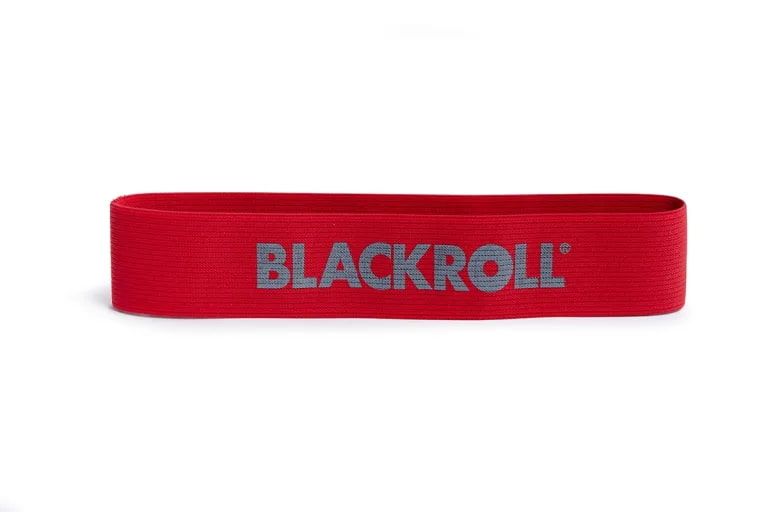 Rotes Loop Band mit grauer Aufschrift BLACKROLL. Auf weißem Hintergrund.