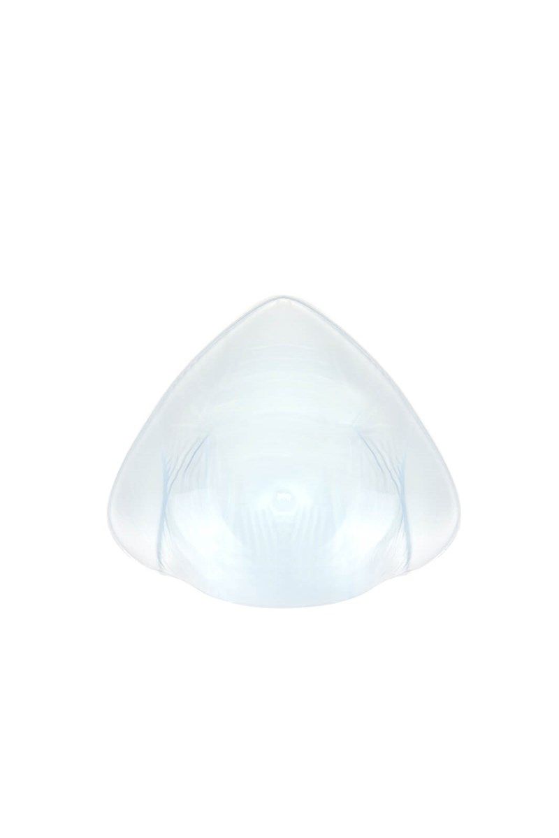 Transparente, tropfenförmige Silikon-Epithese. Oberseite glatt, Unterseite mit feinen Rillen. Dreieckige Form.